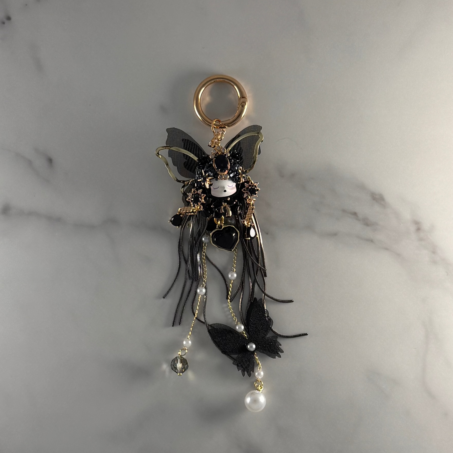 Jokerz Surprise Mini Doll Keychain Reveals